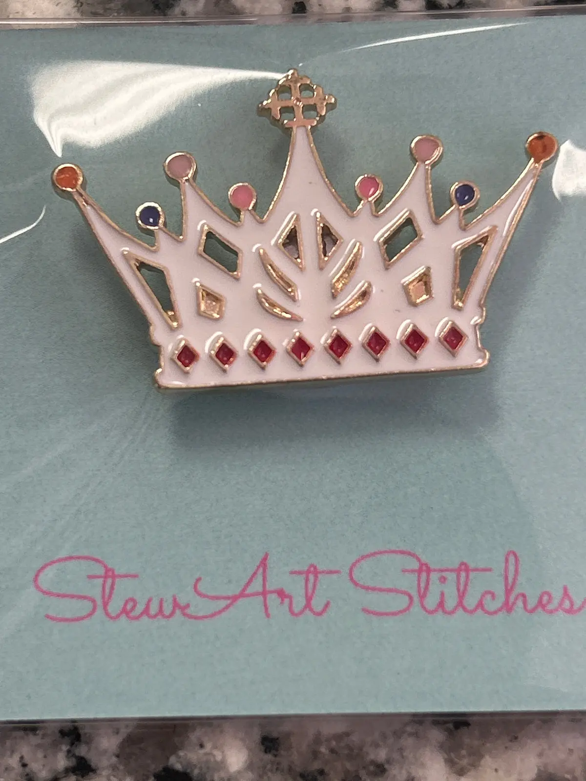 White Crown Needle Minder 1